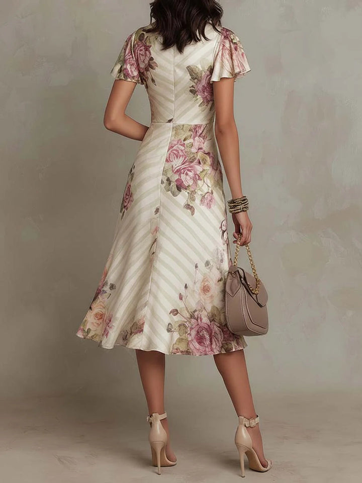 Alba | Elegancka satynowa sukienka midi w stylu retro z kwiatowym wzorem