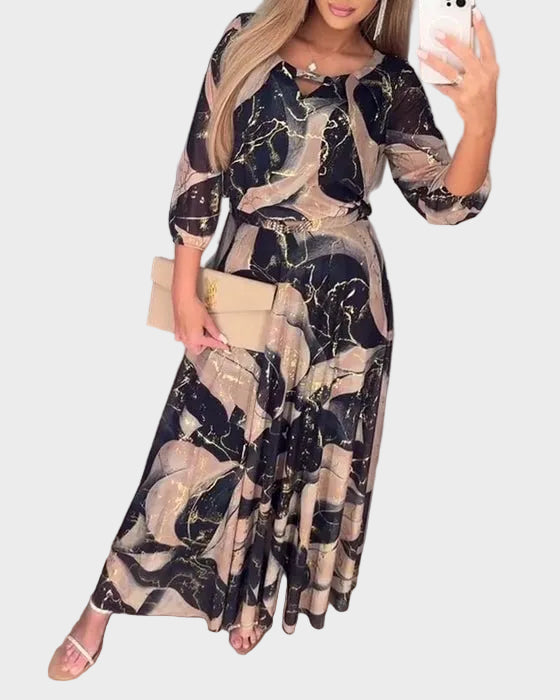 Eva - Elegancka długa sukienka z nadrukiem i rękawem 3/4