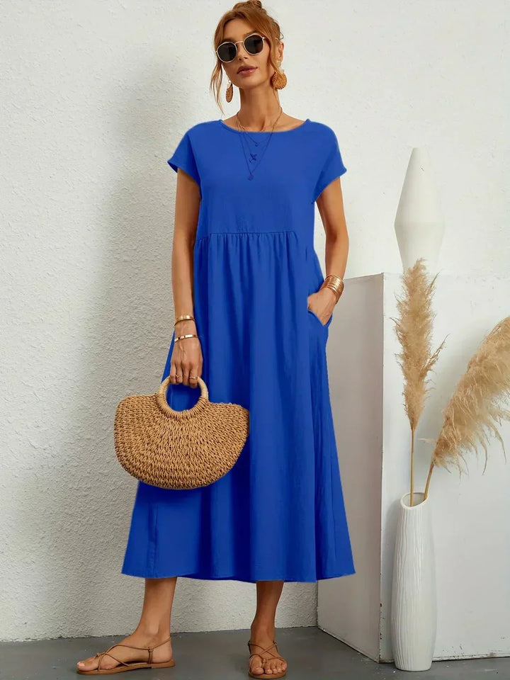 Gabrielle™ — Elegancka, midi sukienka o swobodnym kroju