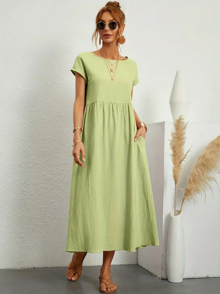 Gabrielle™ — Elegancka, midi sukienka o swobodnym kroju